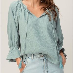 COTTON GAUZE TASSEL V NECK PUFF SLEEVE BLOUSE. 
Fabric 100% COTTON